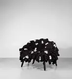 KAWS Chair Black by Kaws and Estudio Campana, 2018, plush toys, stainless steel and Ipe wood, sold Feb 2020