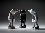Kaws, Three works: (i) SMALL LIE (Brown) ; (ii) SMALL LIE (Black) ; (iii) SMALL LIE (Grey), 2017, painted vinyl, in original Medicom packaging