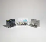 Kaws, Three works: i) HOLIDAY JAPAN (Brown); ii) HOLIDAY JAPAN (Black); iii) HOLIDAY JAPAN (Grey), 2019, painted vinyl, in original Medicom packaging