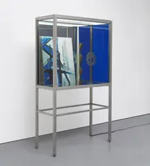 Josephine Meckseper, The Possibility of an Island, 2012, mixed media in stainless steel and glass vitrine with fluorescent light and acrylic sheeting