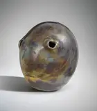 Lucio Fontana, Concetto spaziale, 1962-64, coloured glazed ceramic with holes and graffito