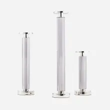 Eichholtz, Chapman candleholders, three works, nickel-plated aluminum, glass