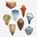 Roseville Pottery, Collection of eight wall pockets