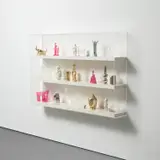 Matthew Darbyshire, Untitled: Shelves No. 1 (series 4), 2011, chromed gold train bong, Buddha head, Morano elephant ornament, tribal figurine, Coca Cola glasses, chromed Coca Cola glasses, chromed silver Rietveld model chair, Alessi cutlery, Morano vase, acrylic bong, clear glass owl ornament, owl jug, owl peanut jar, coronation plate, pink glass bong, shoe horn, glass bell ornaments, acrylic desk sculpture, Vitra Panton chair model, ganesh figurine, Jesus figurine and Shinto gate, in 29 parts