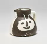 Têtes (Heads) by Pablo Picasso, 1956, White earthenware turned pitcher painted in black, white and green, with partial brushed glaze, sold Jan 2020