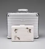 Rimowa x Daniel Arsham, Eroded Attaché, 2019, Cast multiple, contained in a black satin lined aluminium RIMOWA briefcase, with accompanying Owner's Manual and 5-year Rimowa Gurantee Certificate