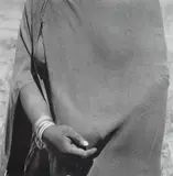 David Goldblatt, Woman going to the trading store holding money under her blanket, near Flagstaff, Transkei