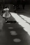 Louis Stettner, Girl Playing in Circles, Penn Station, New York