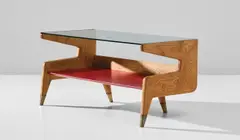 Coffee table, designed for the Second Montecatini building, Milan by Gio Ponti, circa 1951, Oak, vinyl, glass, brass, sold Jun 2020
