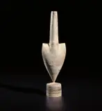 Cycladic arrow form by Hans Coper, circa 1975, Stoneware, layered white porcelain slips and engobes over a body with textured designs, the interior with manganese glaz, sold Jun 2020
