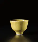 Footed bowl by Lucie Rie, circa 1978, Porcelain, 'American' yellow glaze, sold Jun 2020