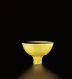 Footed bowl by Lucie Rie, circa 1978, Porcelain, 'American' yellow glaze, sold Jun 2020