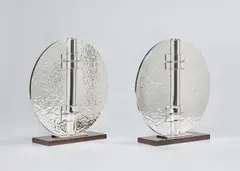 Jean Desprès, Pair of vases, circa 1970, Silver-plated metal, macassar ebony-veneered wood
