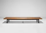 Low bench, from Cité Cansado, Mauritania by Charlotte Perriand, circa 1962, Stained oak, painted steel, sold Jun 2020