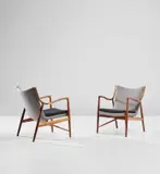 Pair of easy chairs, model no. FJ 45 by Finn Juhl, designed 1945, Brazilian rosewood, fabric, leather, sold Jun 2020