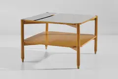 Coffee table by Gio Ponti, circa 1965, Plastic-laminated wood, ash, brass, sold Jun 2020