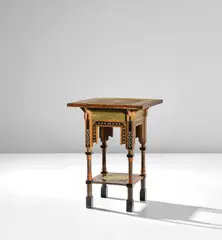 Carlo Bugatti, Side table, circa 1898, Walnut, ebonised walnut, repoussé brass, copper, brass and pewter inlays