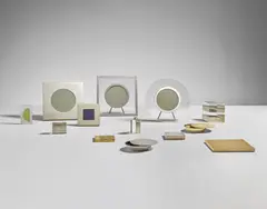 Gabriella Crespi, Group of five picture frames, four cigarette cases, two ashtrays, one lidded box and one lighter, 1970-1973, Brass, nickel-plated brass, acrylic, glass, travertine