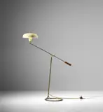 Rare adjustable standard lamp by Angelo Lelii, circa 1951, Painted aluminium, brass, leather, sold Jun 2020