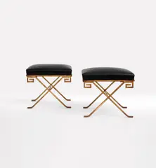 Jean-Michel Frank, Pair of stools, circa 1938, Gilt iron, leather
