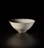 Conical bowl by Lucie Rie, circa 1972, Stoneware, glaze, mixed clays producing an integral spiral, sold Nov 2020