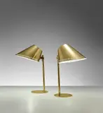 Pair of adjustable desk lamps, model no. 9227 by Paavo Tynell, 1950s, Partially painted brass, brass, sold Nov 2020