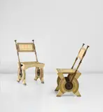 Carlo Bugatti, Pair of adjustable side chairs, circa 1902, Partially painted vellum-covered wood, embossed vellum, oak, repoussé brass