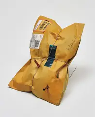 Ron Arad, Signed for, 2019, paper envelope, screws, foam, enamel paint, coloured pencils, graphite pencil, plastic covered wire, postage stamps and enamel paint on address label