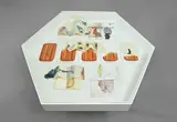 Jitish Kallat, Afterword (versions of a disappearing act), 2010-11, wax, oil, acrylic, enamel paint, graphite, ink, tracing paper and paper collage and mixed media on paper, in 14 parts, in glass top table