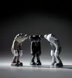 Kaws, Three works: (i) SMALL LIE (Brown) ; (ii) SMALL LIE (Black) ; (iii) SMALL LIE (Grey), 2017, painted vinyl, in original Medicom packaging