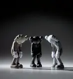Kaws, Three works: (i) SMALL LIE (Brown) ; (ii) SMALL LIE (Black) ; (iii) SMALL LIE (Grey), 2017, painted vinyl, in original Medicom packaging