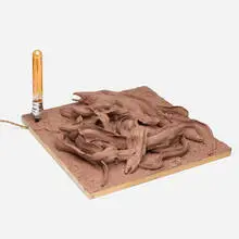 Jeffrey Joyal, Grey Sweet Mother, 2014, oil clay on wood, Edison bulb and hardware