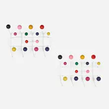 Hang-It-All, pair by Charles and Ray Eames, enameled steel, lacquered wood, sold Feb 2025