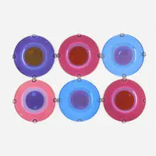 Rondelays, set of six by Frances and Michael Higgins, c. 1960, fused glass, brass, sold Feb 2025