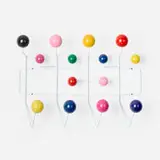 Hang-It-All by Charles and Ray Eames, enameled steel, lacquered wood, sold Feb 2025
