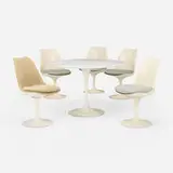 Eero Saarinen, Dining suite, enameled steel and aluminum, marble, fiberglass, upholstery