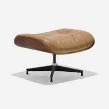 671 ottoman by Charles and Ray Eames, leather, rosewood, enameled and brushed aluminum, sold Feb 2025