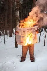 Tim Parchikov, Burning News, 2018, c-print, in artist's frame