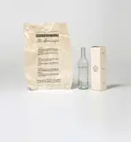 Marcel Broodthaers, Le Manuscrit trouvé dans une bouteille (The Manuscript Found in a Bottle), 1974, Glass bottle with printed title, tissue paper with printed text, and cardboard box