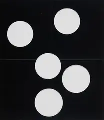 Wade Guyton, Untitled, 2007, Black vinyl paper with circular cut-outs, folded into quarters (as issued), contained in the original cardboard box with screenprint on lid