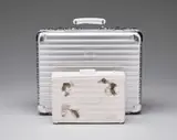 Rimowa x Daniel Arsham, Eroded Attaché, 2019, Cast multiple, contained in a black satin lined aluminium RIMOWA briefcase, with accompanying Owner's Manual and 5-year Rimowa Gurantee Certificate