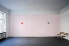Pharmacie, from Wall Works by Sherrie Levine, 1996, Two cast aluminium industrial lamps with red and green glass, to be installed on a mauve-painted wall, sold Jun 2019