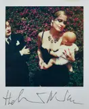 Woman holding doll by Helmut Newton, n.d., Unique Polaroid print, offered May 2019
