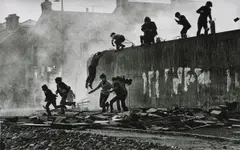 Don McCullin, Gangs of Boys Escaping C.S. Gas Fired by British Soldiers, Londonderry, Northern Ireland, 1971, Gelatin silver print, printed 2014