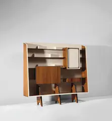 Rare bookcase with integrated drinks cabinet, designed for the 'Prima mostra dell'arredamento', Como by Gio Ponti, circa 1945, East Indian rosewood-veneered wood, painted wood, mirrored glass, brass, offered Mar 2019