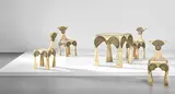 Carlo Bugatti, Rare games table and set of four chairs, circa 1902, Vellum-covered wood, repoussé brass, brass, pewter, ebonised veneered-wood, walnut-veneered wood