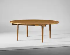 Dining table by Hans J. Wegner, circa 1960, Oak-veneered wood, oak, nickel-plated brass, sold Mar 2019