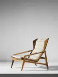 Armchair, model no. 811 by Gio Ponti, circa 1956, Walnut, fabric, rubber, painted metal, sold Mar 2019