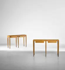 Two console tables by Gio Ponti, circa 1955, Walnut-veneered wood, East Indian rosewood-veneered wood, sold Mar 2019