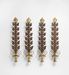 Set of four wall ornaments by Gilbert Poillerat, circa 1946, Wrought iron, gold leaf, sold Oct 2019